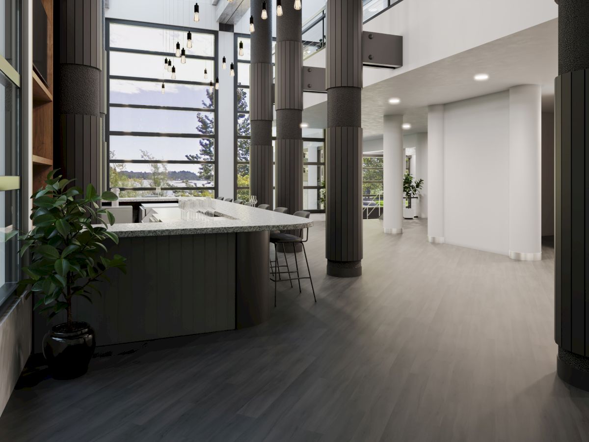 A modern interior with large windows, columns, a countertop with stools, and plants, creating a bright and open atmosphere.